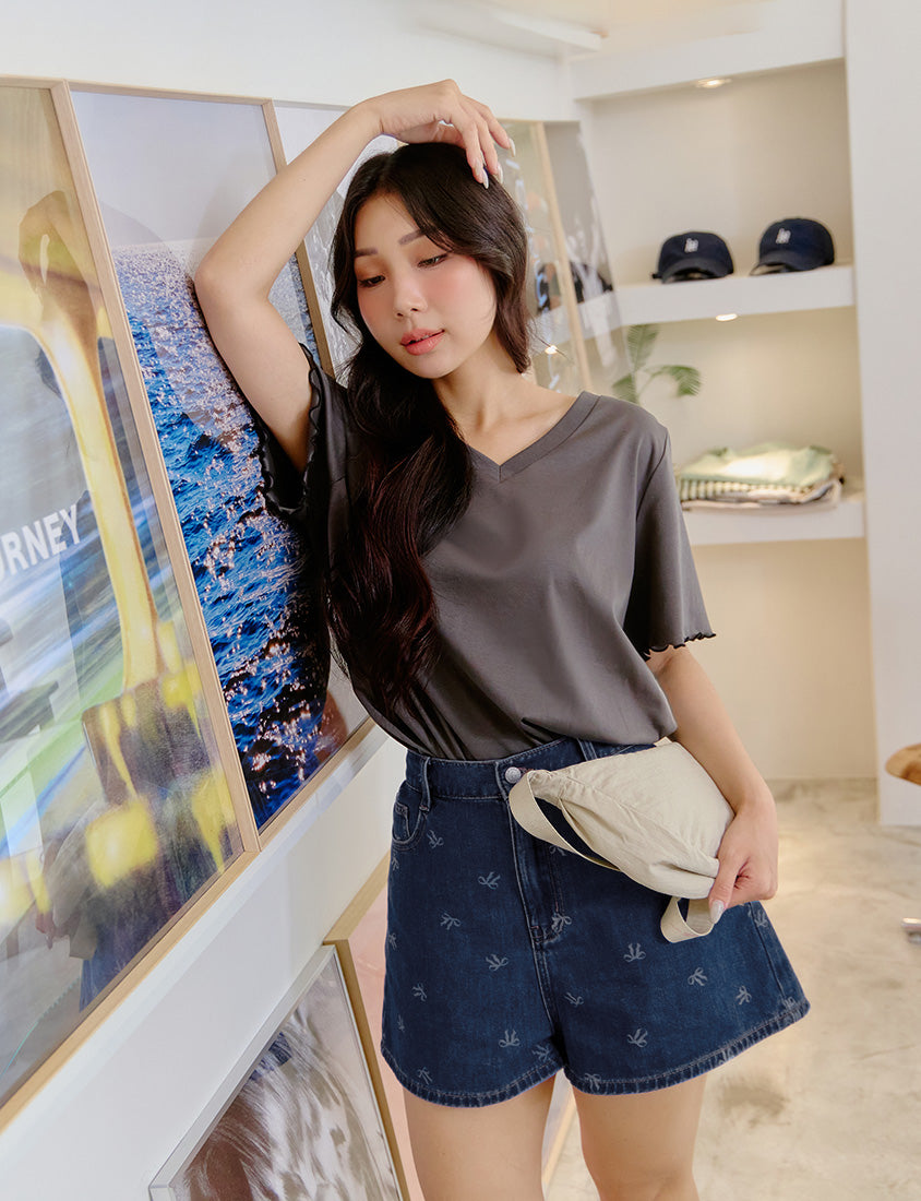 Playful All-Over Bow Plus Size Denim Shorts