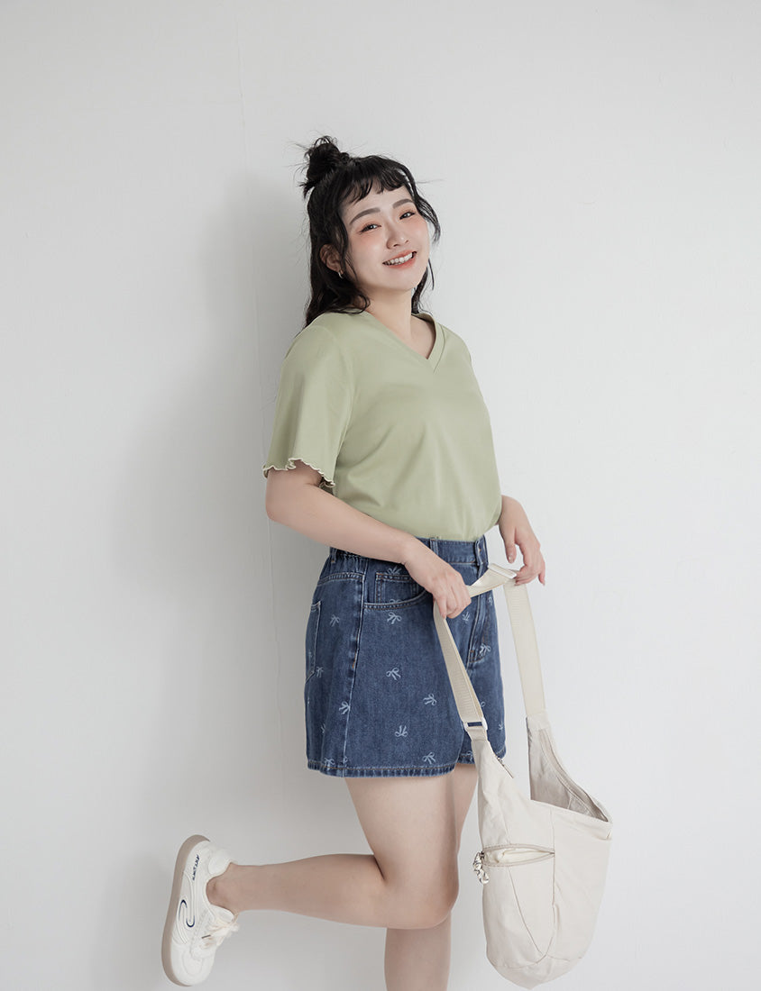 Playful All-Over Bow Plus Size Denim Shorts