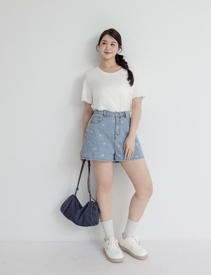 Playful All-Over Bow Plus Size Denim Shorts