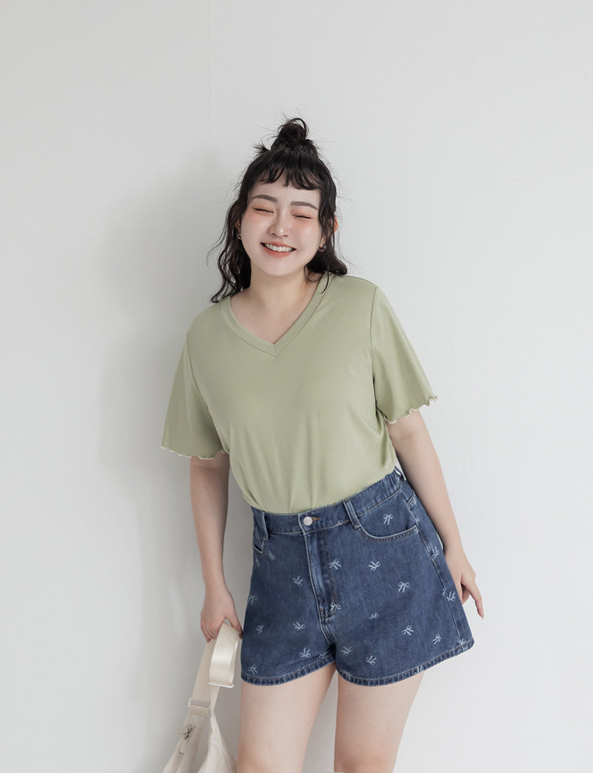 Playful All-Over Bow Plus Size Denim Shorts