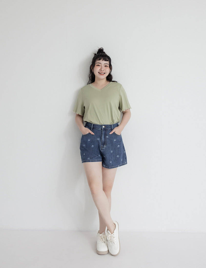 Playful All-Over Bow Plus Size Denim Shorts