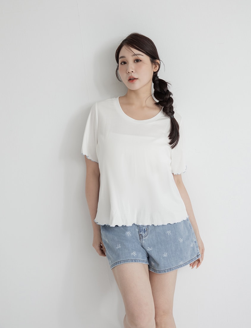 Playful All-Over Bow Plus Size Denim Shorts