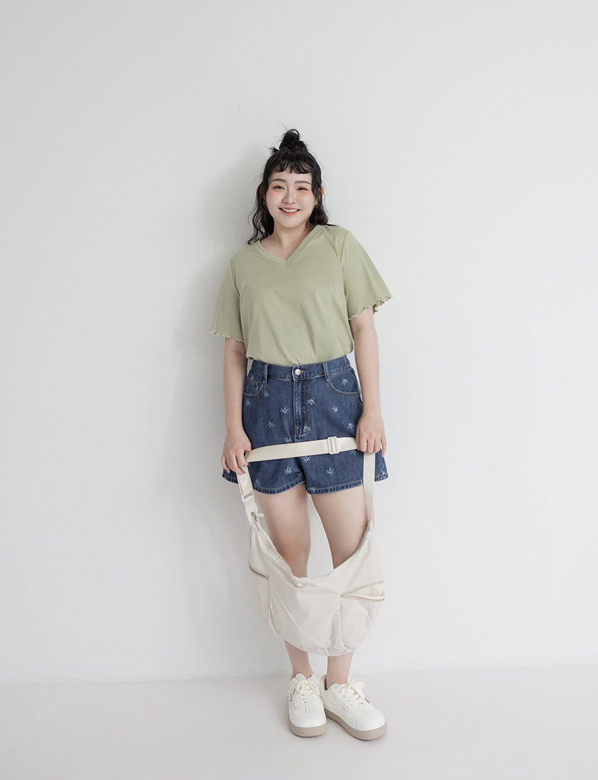 Playful All-Over Bow Plus Size Denim Shorts