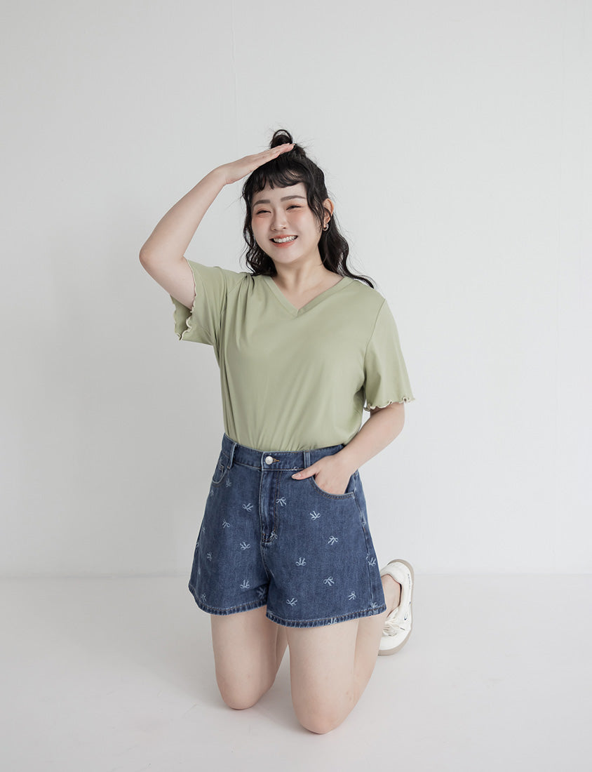 Playful All-Over Bow Plus Size Denim Shorts